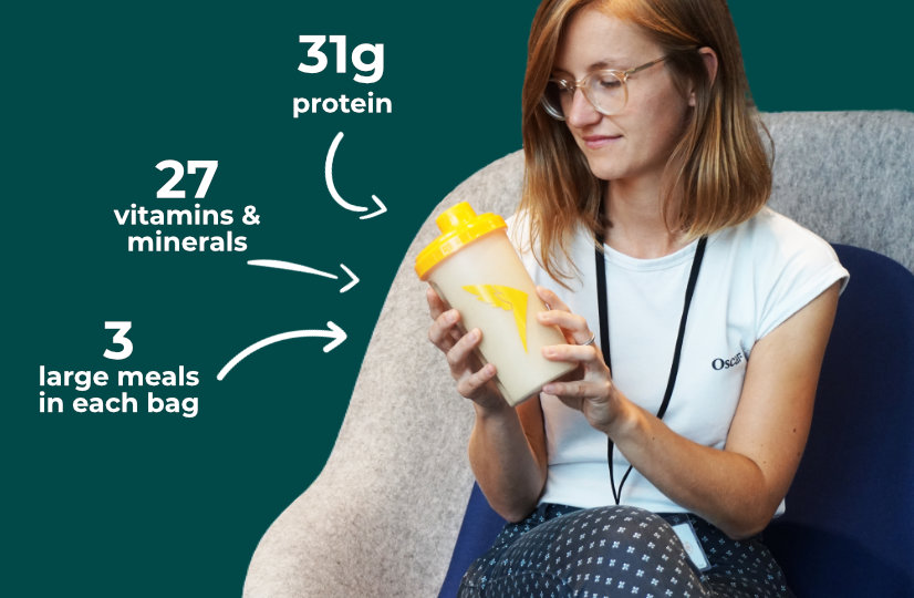 Woman sitting and holding a Queal shaker with text highlighting 35g protein, 27 vitamins & minerals, and 3 large meals in each bag.